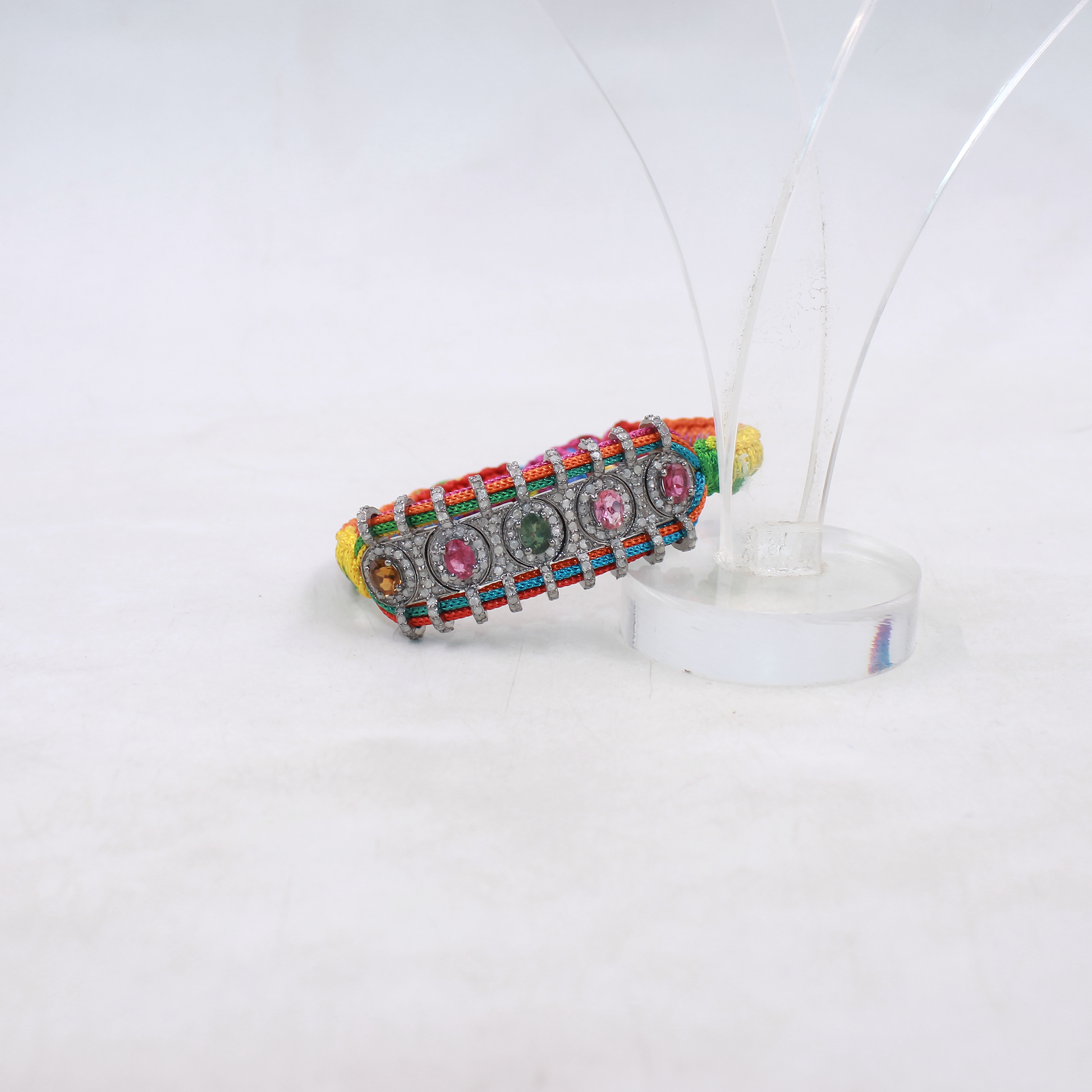 Vibrant gemstone bracelet featuring tourmaline and pave diamonds in sterling silver