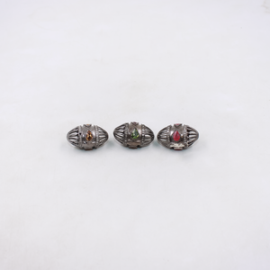 Luxury gemstone and diamond bead in oval silver design