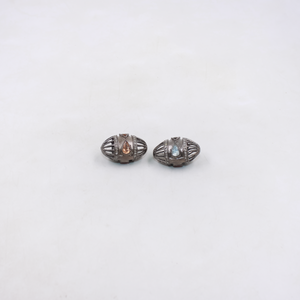 Handmade oval cage bead with gemstone and diamonds
