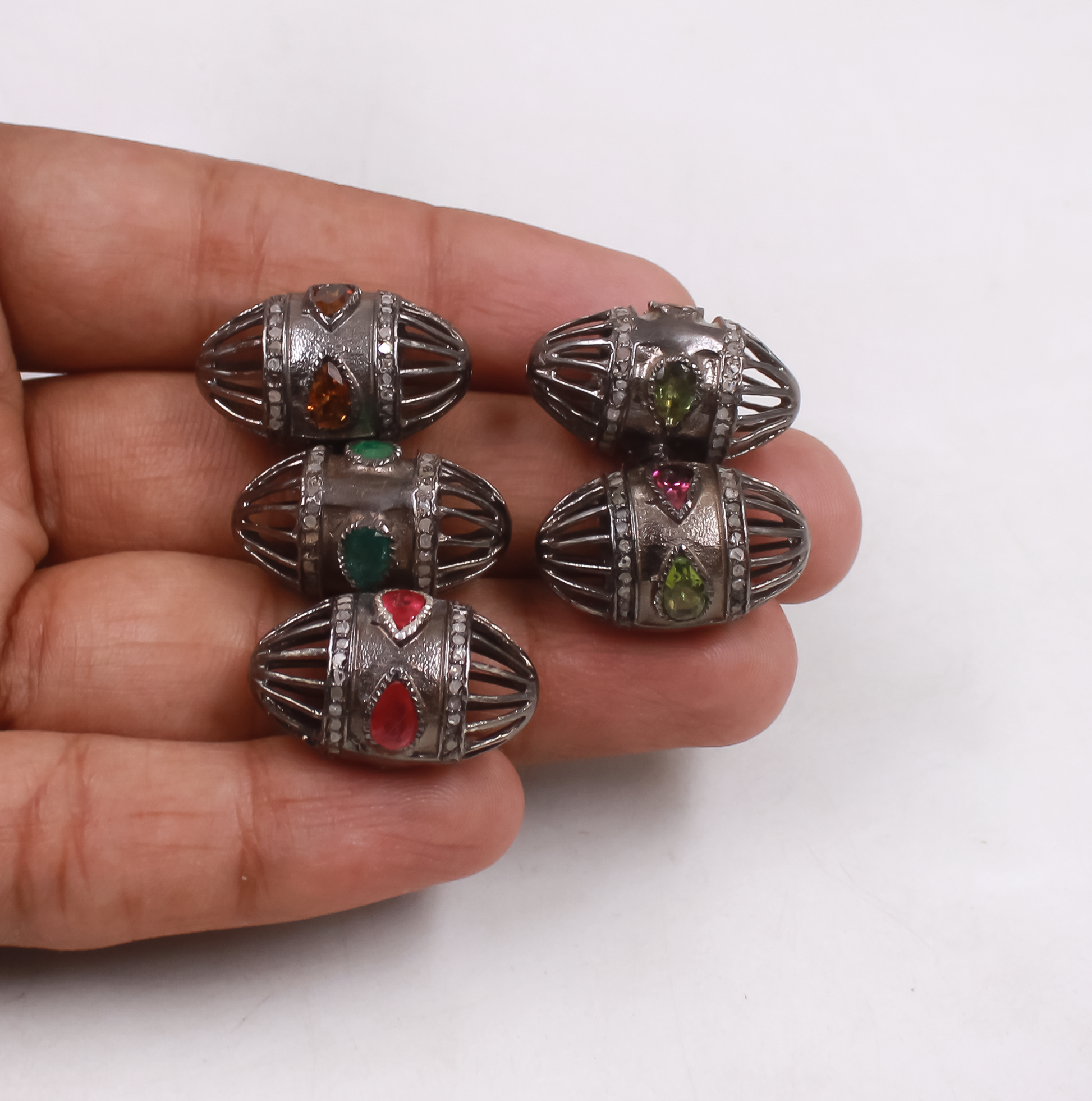 Artisan-crafted emerald and diamond oval bead for jewelry making