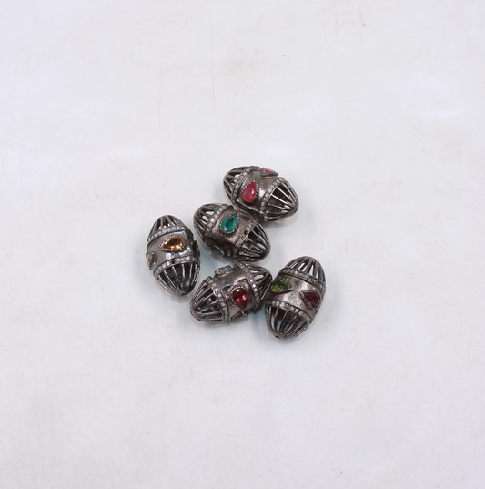 Oval cage style bead with emerald and pave diamonds in sterling silver