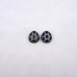 Blue sapphire bead with natural diamonds set in sterling silver