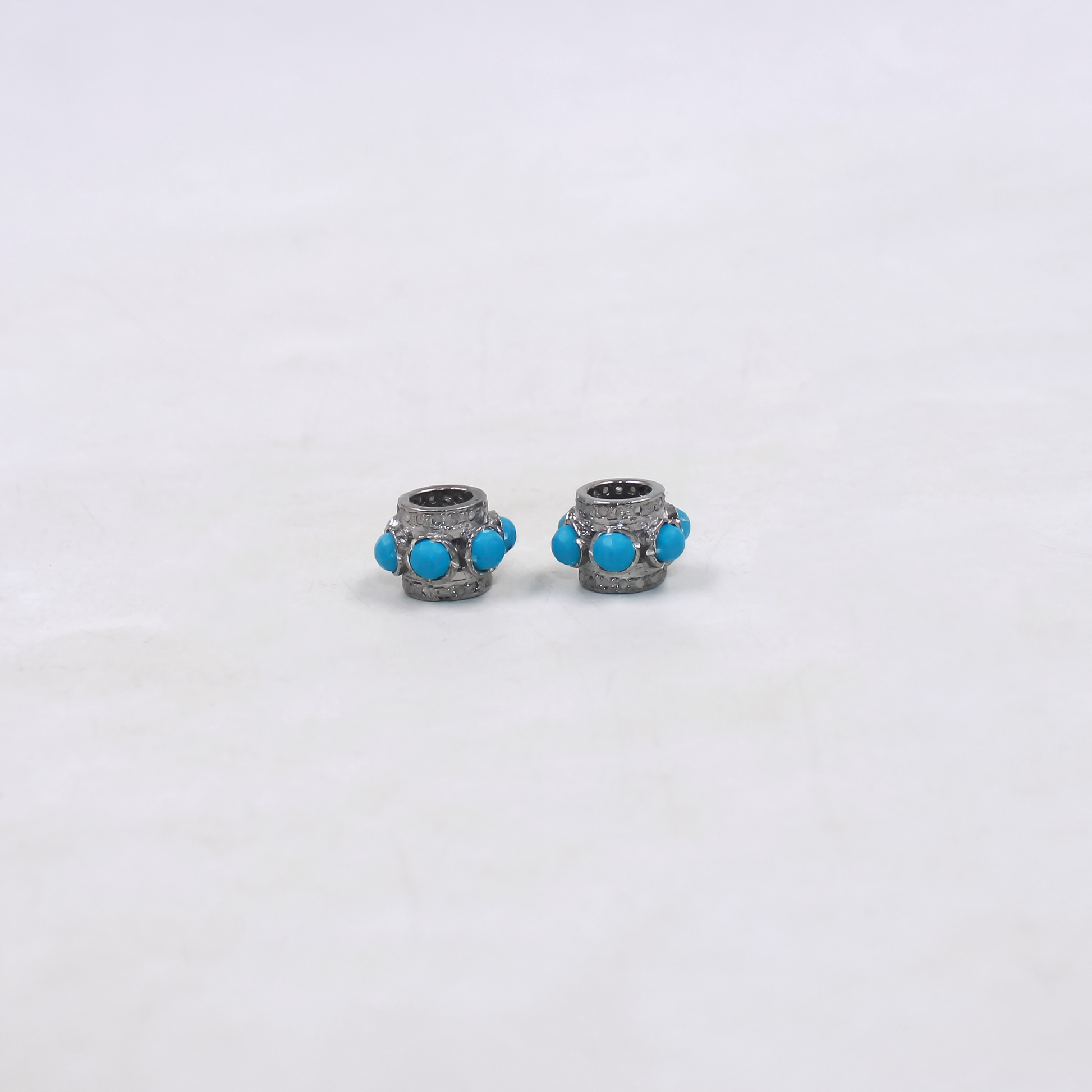 Designer turquoise and diamond bead in oxidized sterling silver