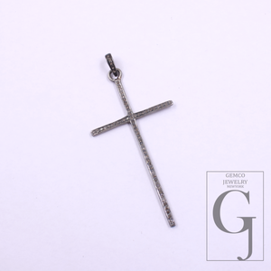 Silver cross pendant on a light purple background with 'GEMCO JEWELRY' logo.