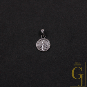 Silver peace symbol pendant on a black background with Gemco Jewelry logo.