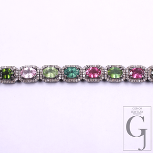 Jewelry bracelet with multicolor gemstones on a white background