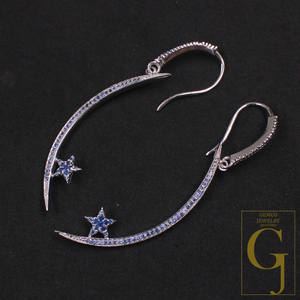 Silver earrings with star designs on a dark background, featuring Gemco Jewelry logo.